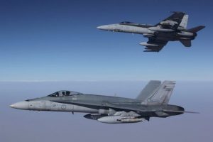 RAAF warplanes fly over Syria in Australia’s first airstrikes on that country in September 2015. (Image: AAP/ADF)