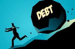 man running down hill with ball of debt following