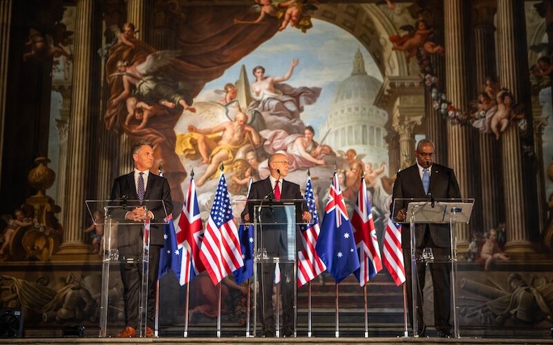 Australia Deputy Prime Minister Richard Marles (left), UK Defence Secretary John Healey (centre), and US Secretary of Defense Lloyd Austin III (right) addressing the media in the Painted Hall at the Old Royal Naval College, Greenwich UK.