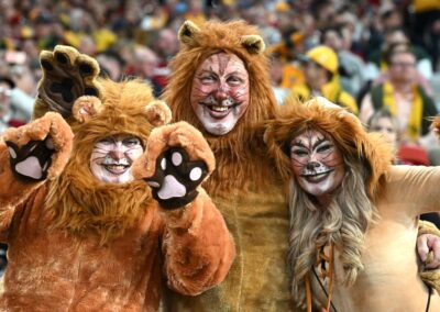 Footy fans help consumer spending roar into growth