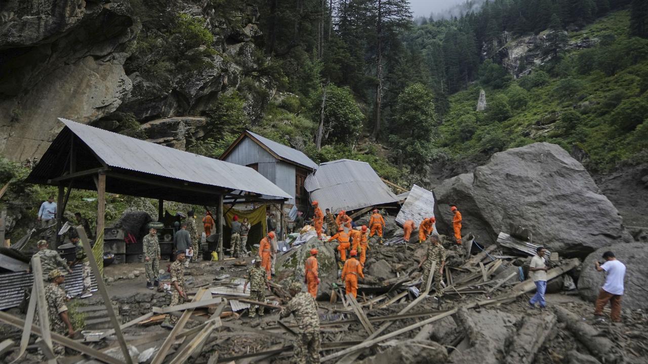 Indian National Disaster Response personnel during a rescue operation