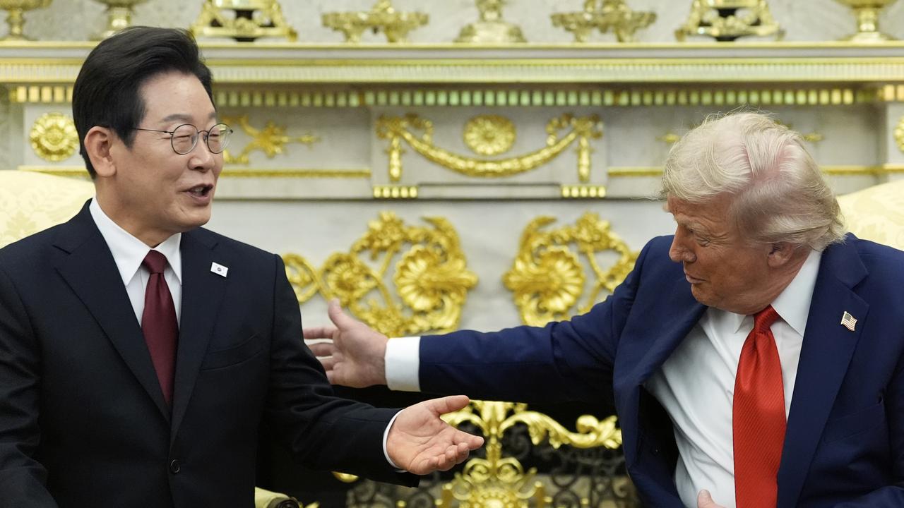 A file photo of Lee Jae Myung and Donald Trump
