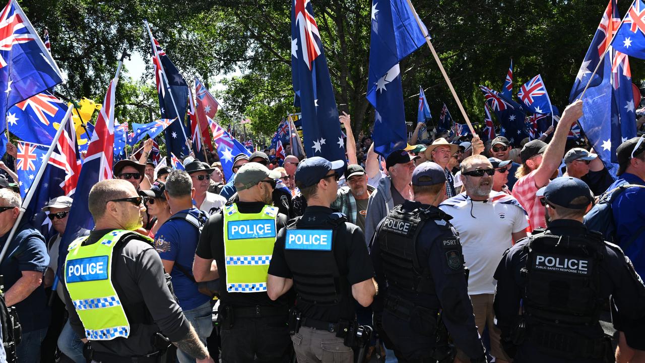 Police separating Pro and Anti-immigration protesters  in Brisbane