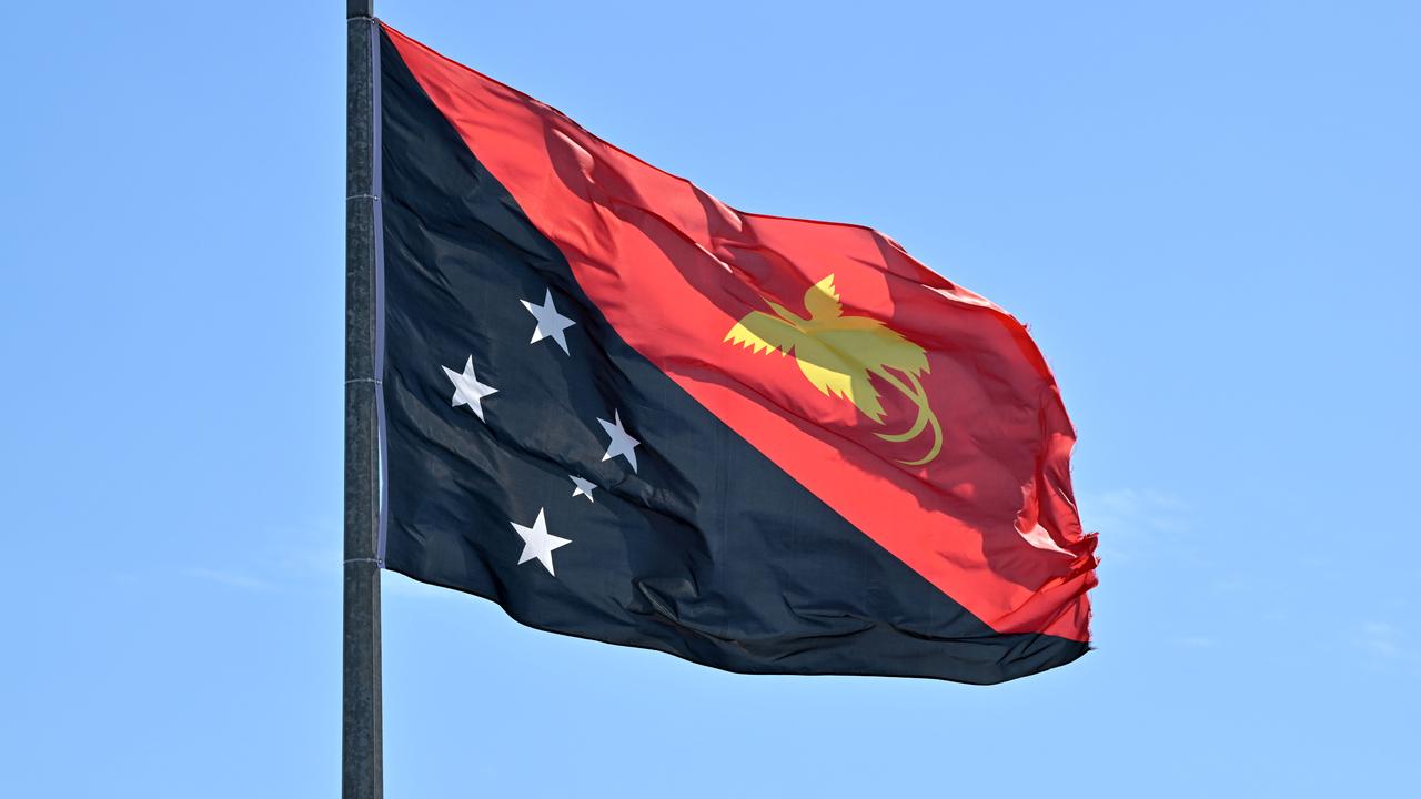 A flag flies in Port Moresby, Papua New Guinea