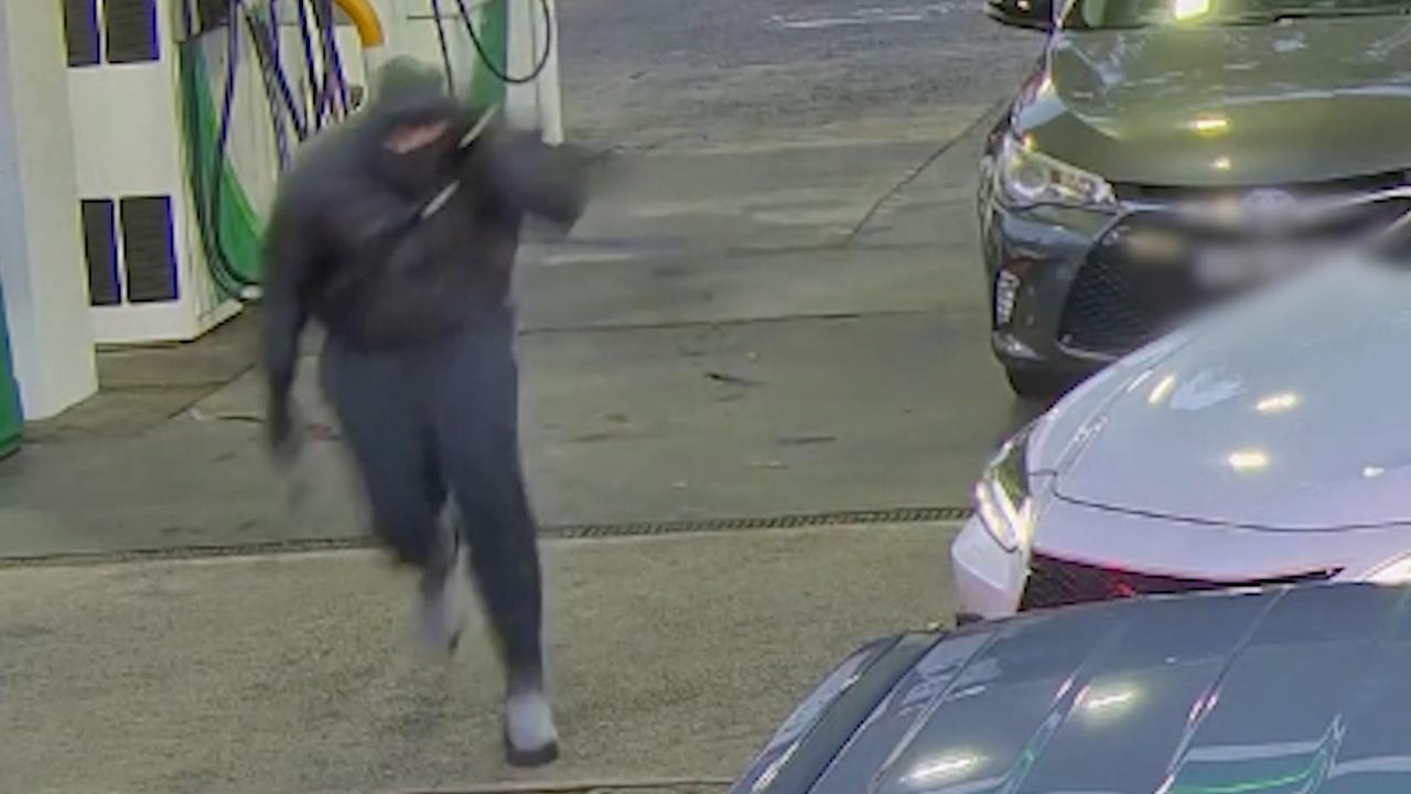 One of the masked gunmen