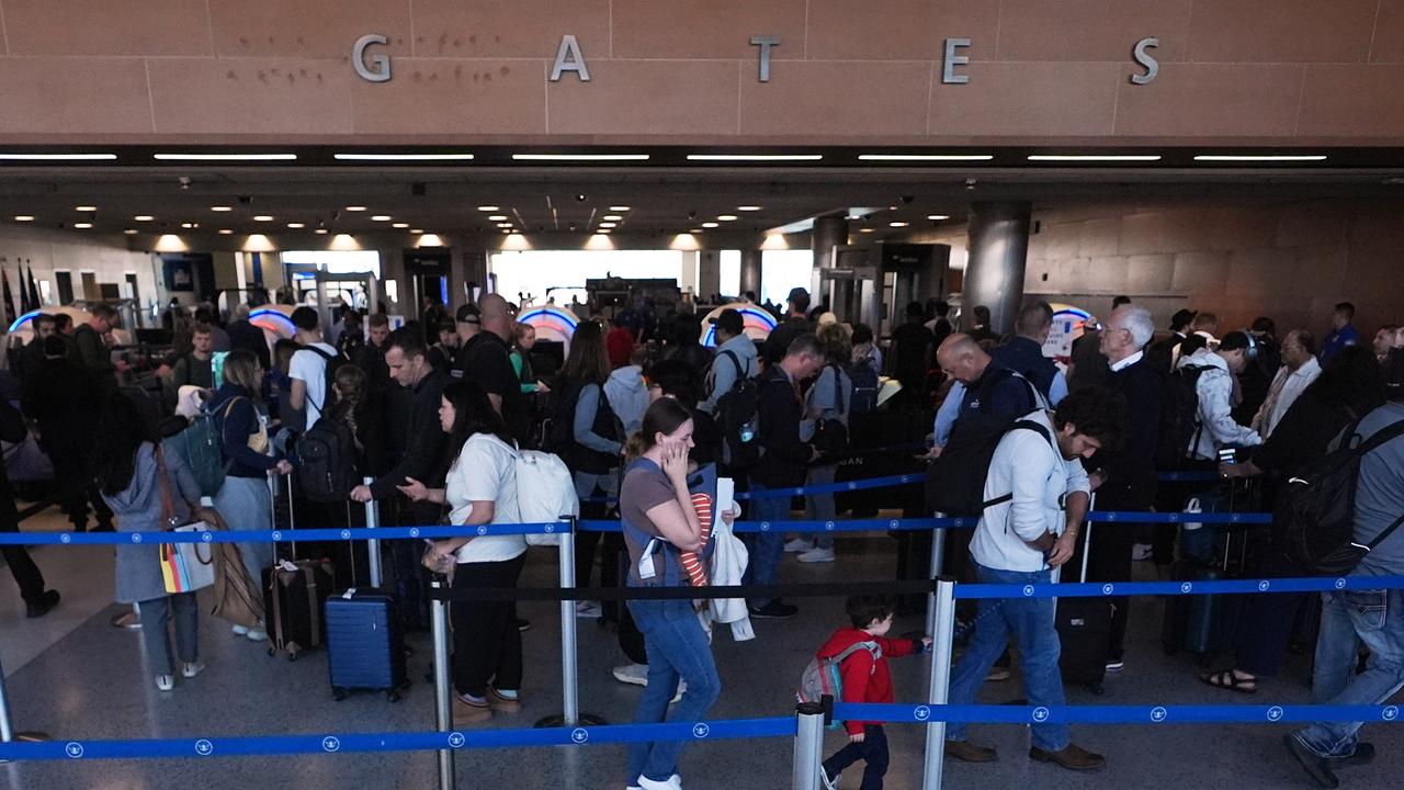 sign is shown outside the TSA screening area at an airport