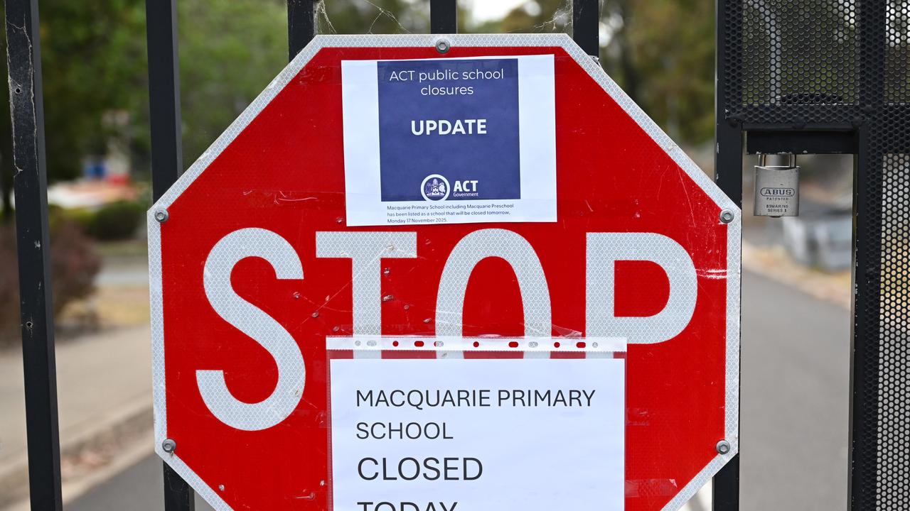 A closed sign at the gate to Macquarie Primary School in Canberra