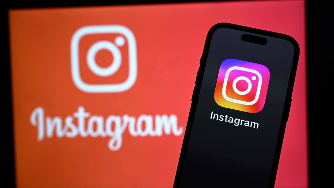 The logo of social media app Instagram on a smartphone