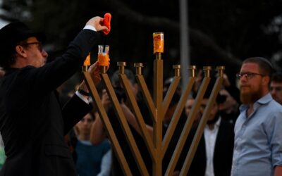 Heartbroken Bondi mourners light path out of darkness
