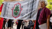Jews against the occupation banner at Sydney Town Hall Vigil on 22 December 2025. Credit: Zebedee Parkes