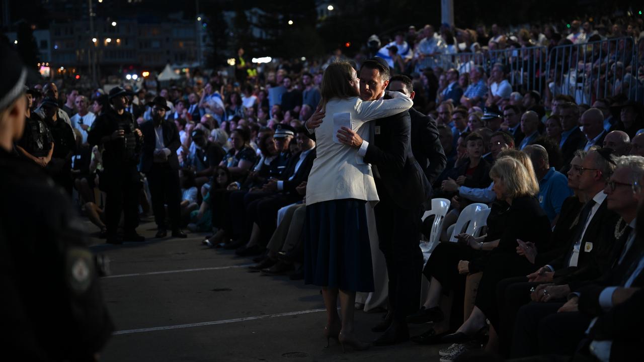 NSW Premier Chris Minns embraces Opposition Leader Kellie Sloane,