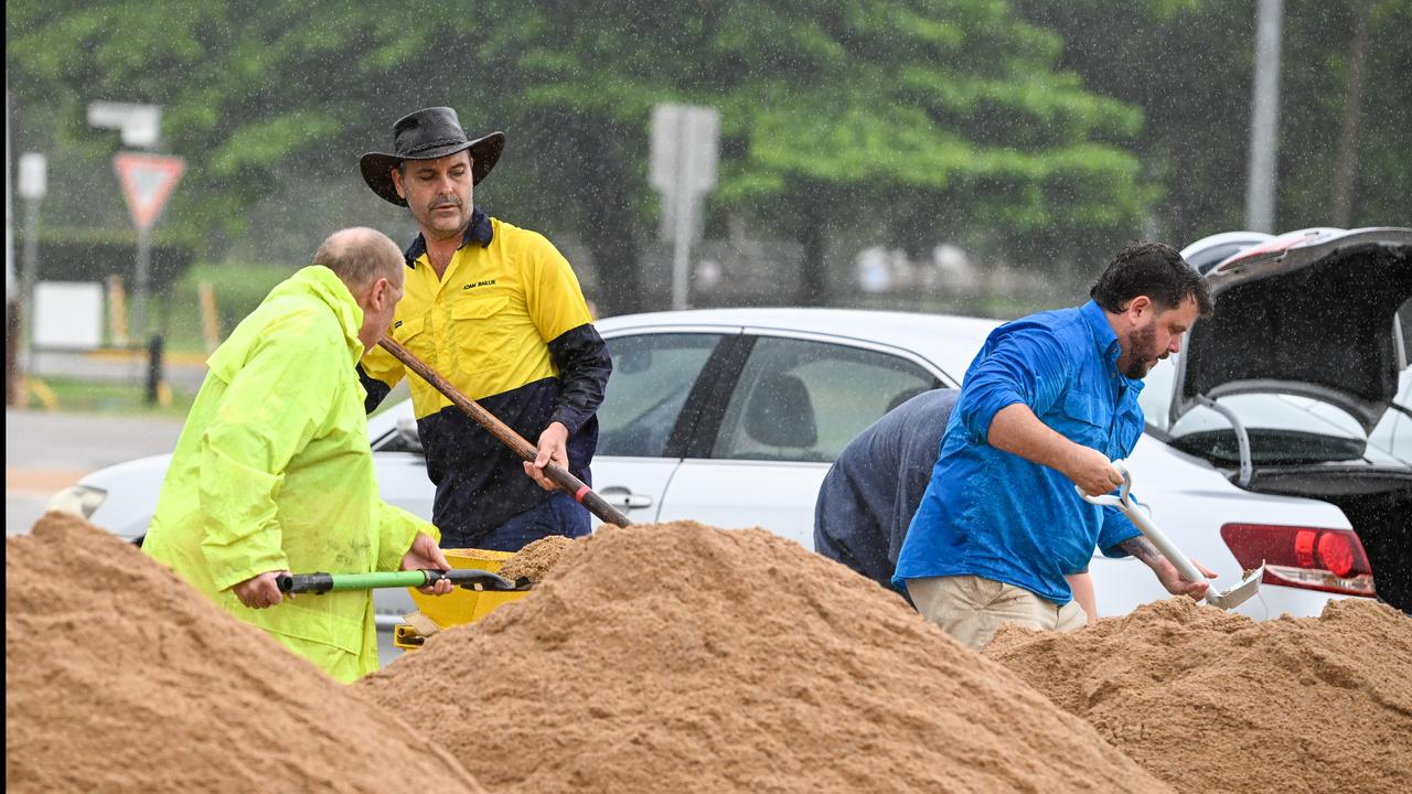 People filling sandbags