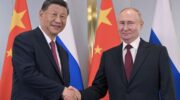 Winners are grinners. China's Xi Jinping and Russia's Vladimir Putin. Image: BRICS