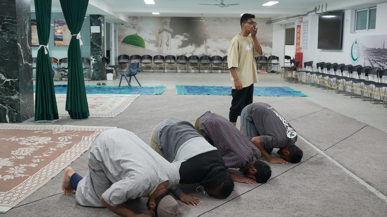 Worshippers inside Lakemba Mosque