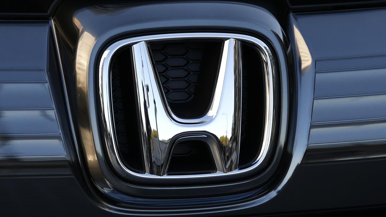 Honda Motor Co logo on a vehicle