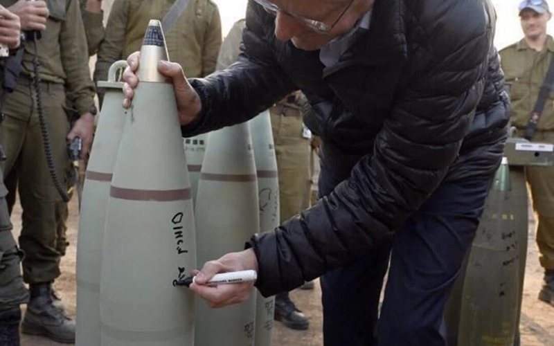 Israel's President Isaac Herzog signs bombs destined for Gaza