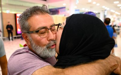 War-trapped Aussies arrive home on first Dubai flight