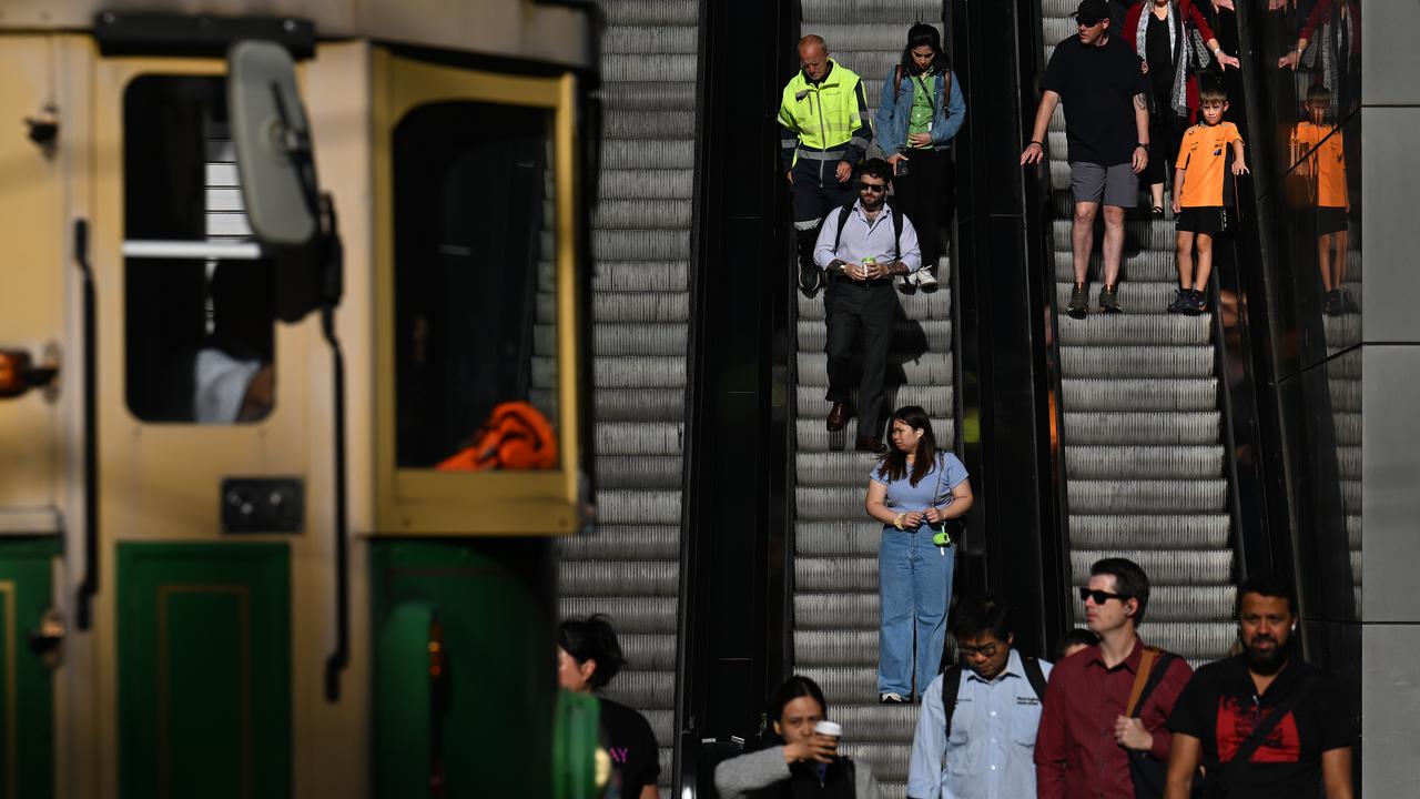 People on escalators (file image)