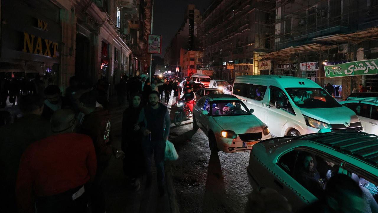 Cars driving without street lamps