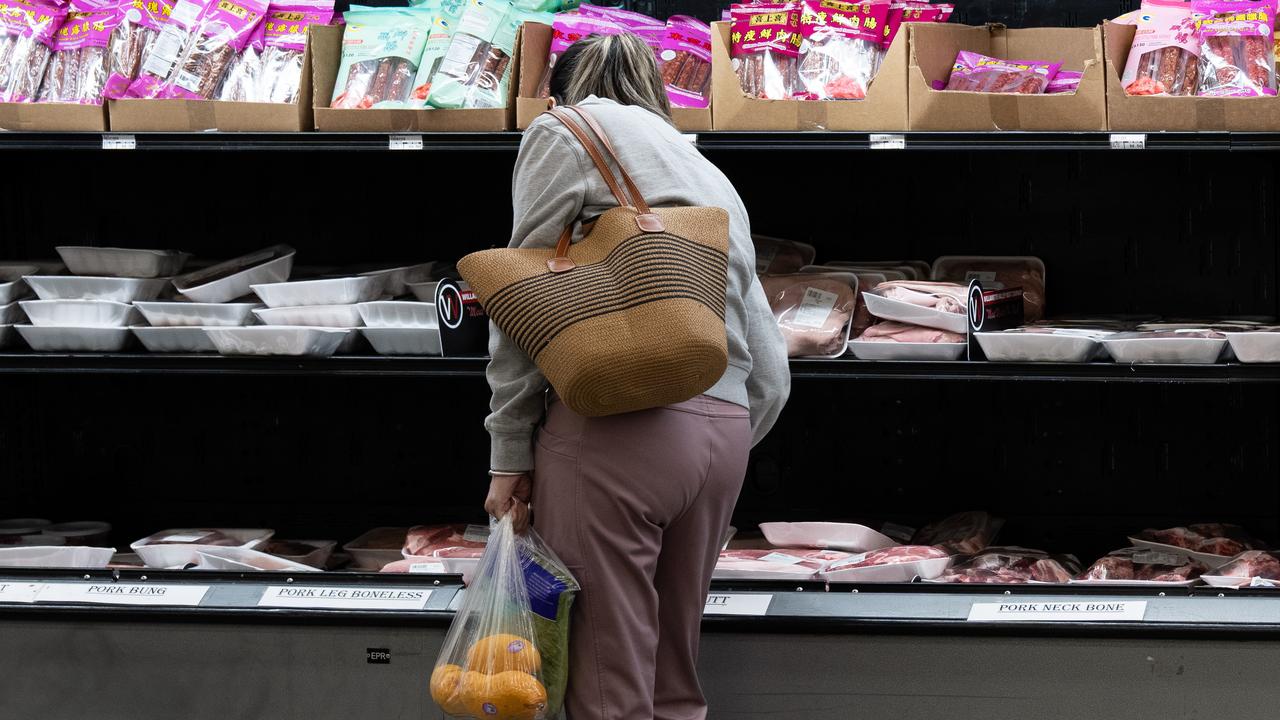 A customer shops at a grocery store in Portland, Oregon