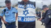 NSW Police detain Andrew Brown at Bondi Beach for t-shirt