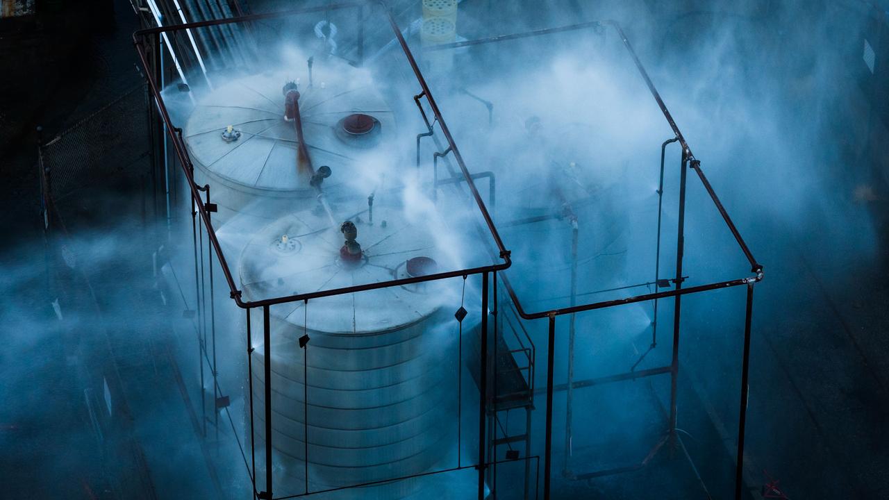 Water being sprayed on the tank