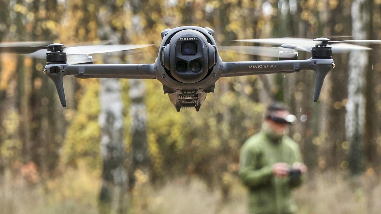 Ukraine serviceman flying a drone