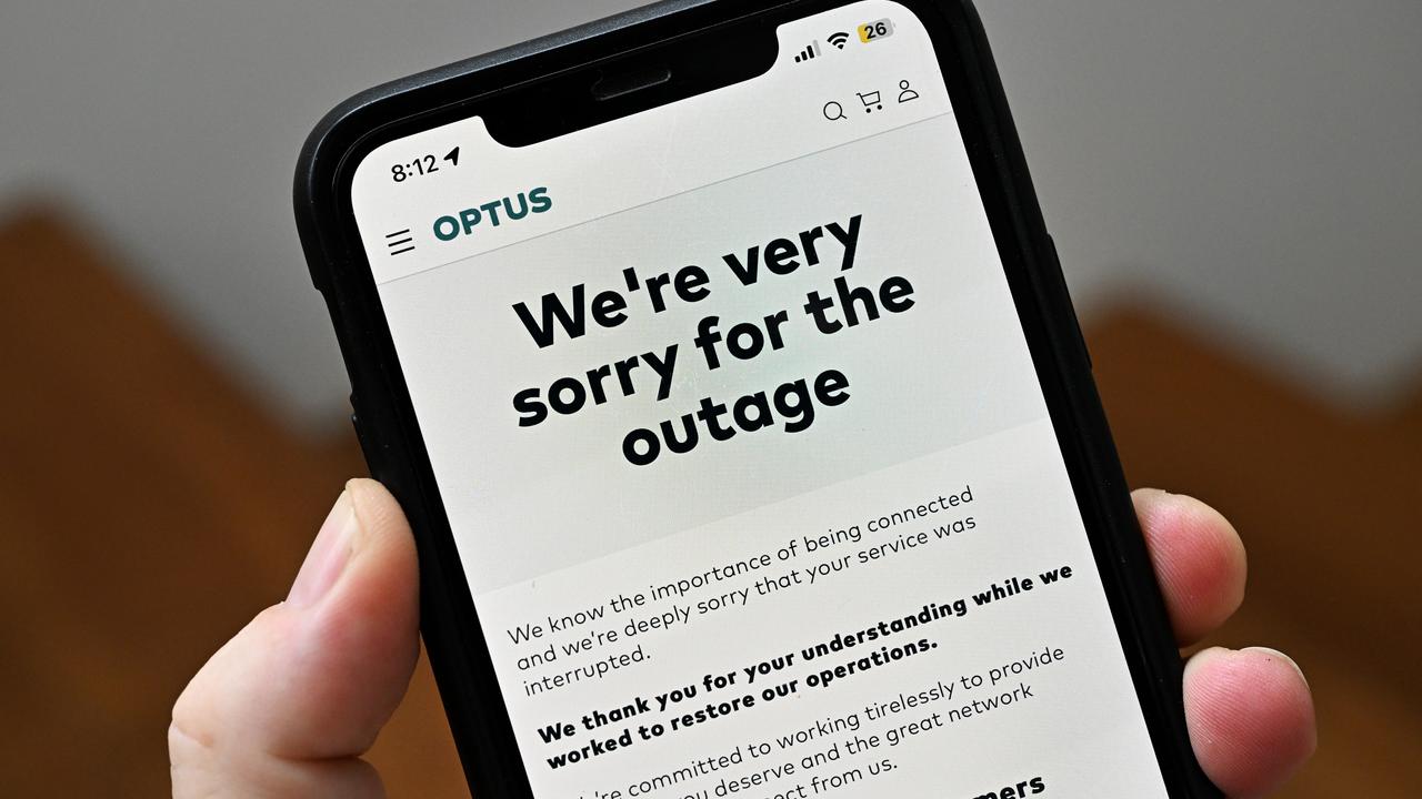 An Optus apology seen on a phone (file image)