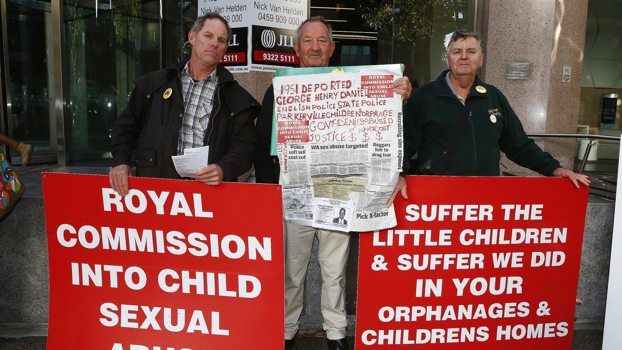 Placards at the royal commission in 2014